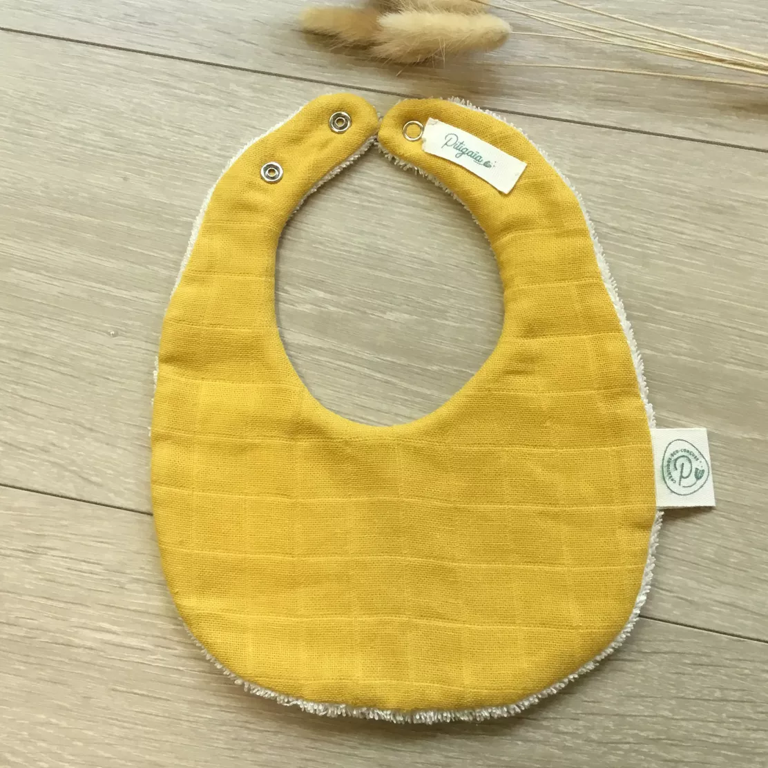 Mini-bavoir jaune en coton bio